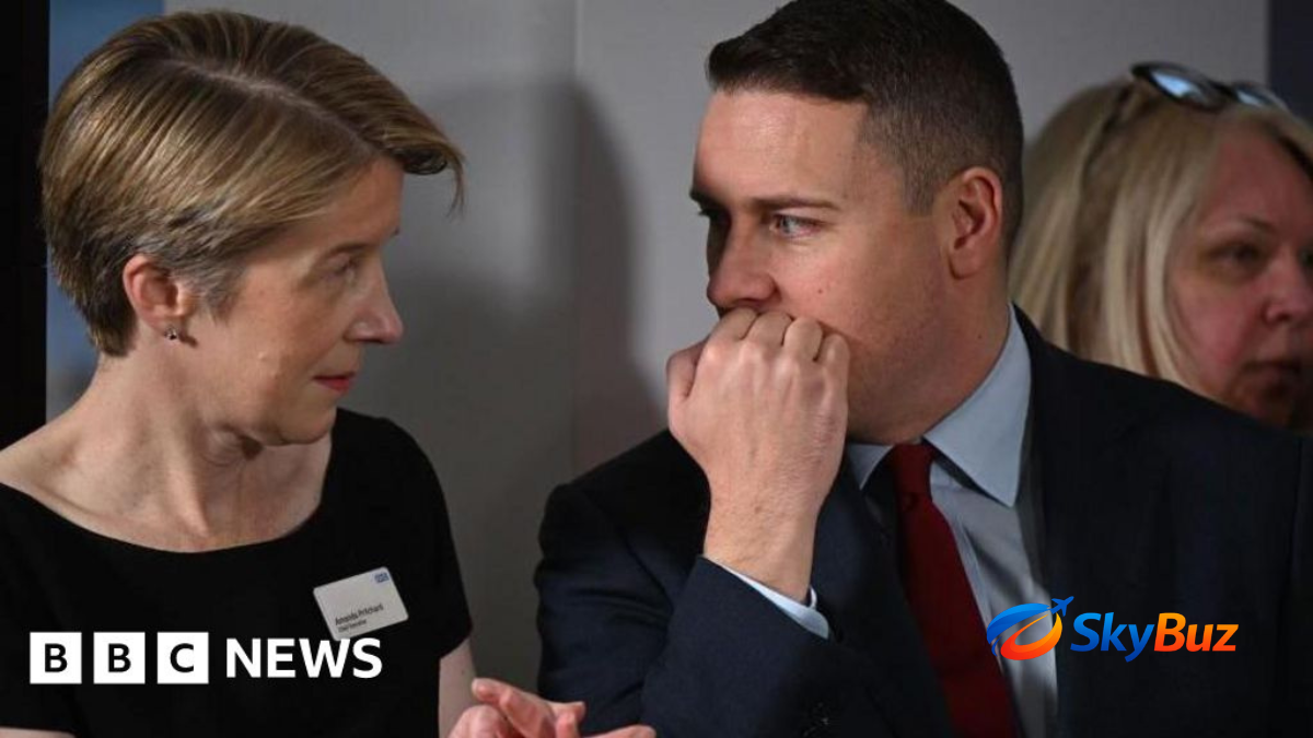 nhs england job cuts